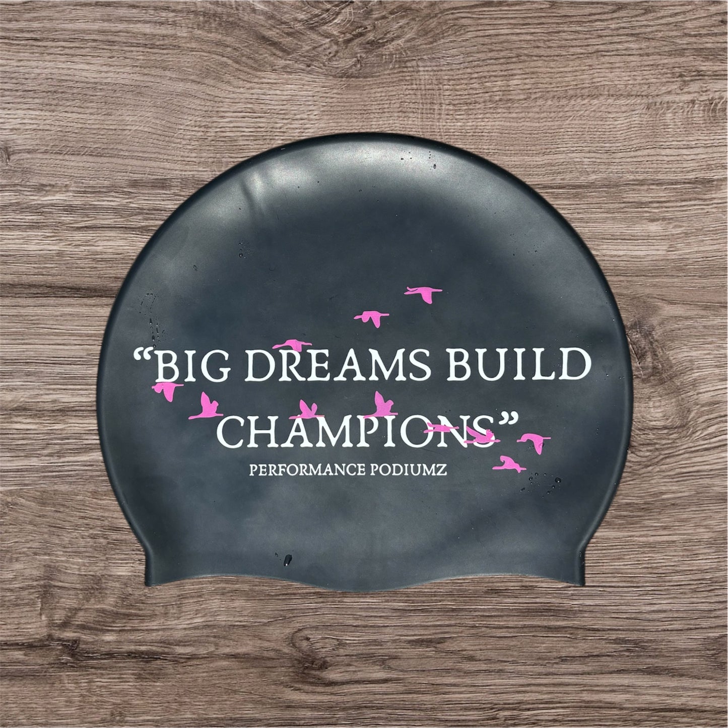 Casque de bain noir et rose "Big dreams build champions"(taille standard)