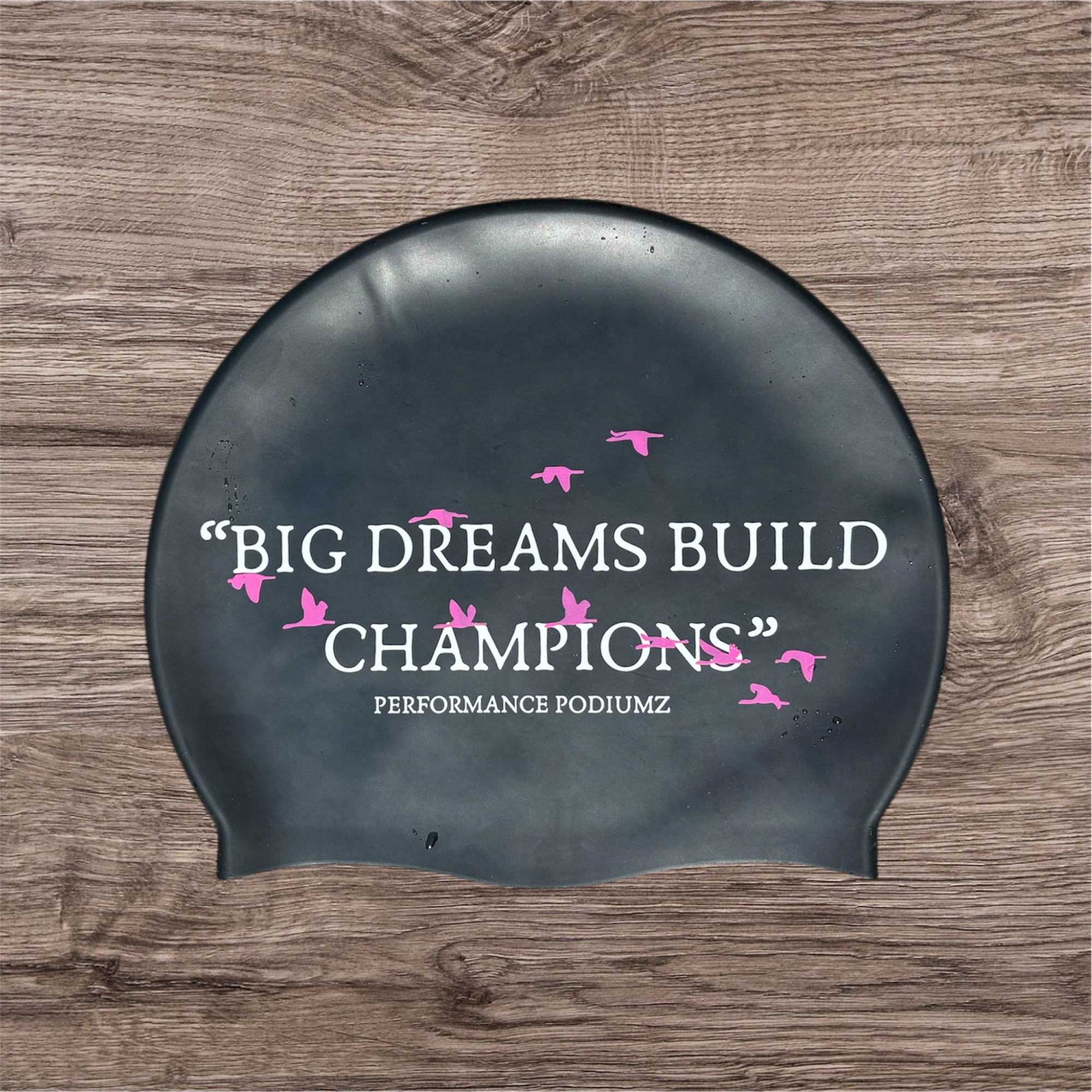 Casque de bain noir et rose "Big dreams build champions"(taille standard)