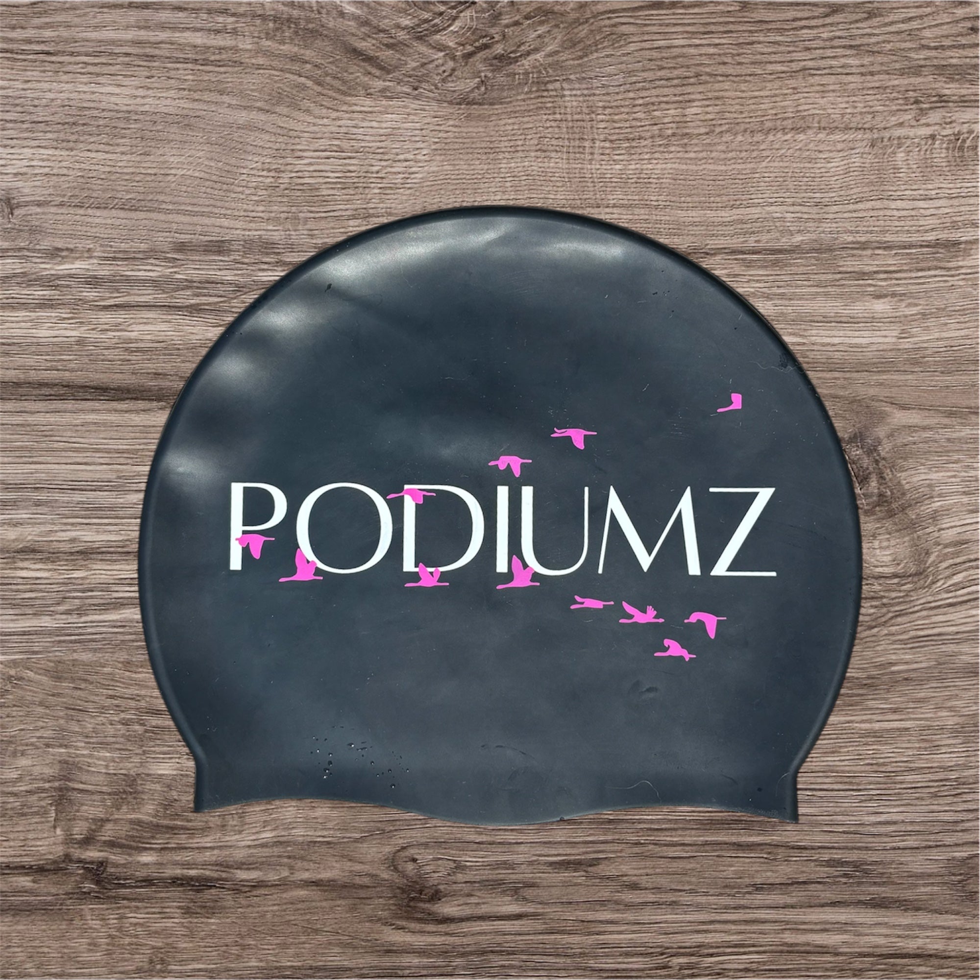 Casque de bain noir et rose "Big dreams build champions"(taille standard)